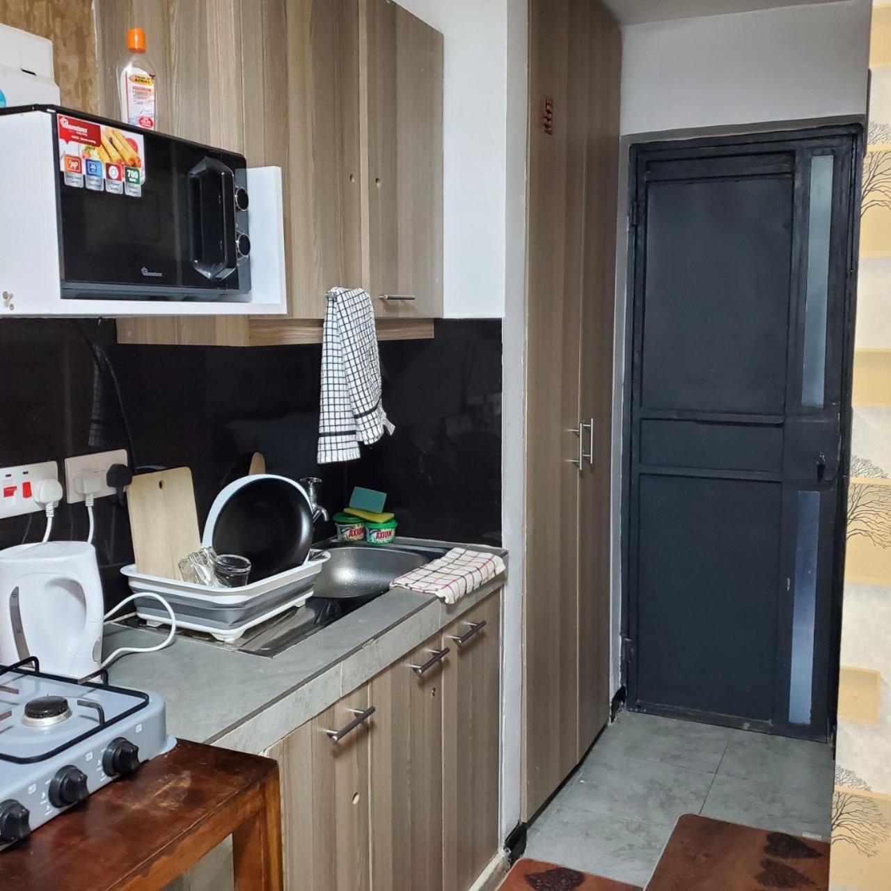 Lovely & Cozy Compact Studio Near Airport With Rooftop View Apartment Nairobi Ngoại thất bức ảnh